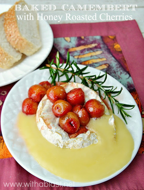 Baked Camembert with Honey Roasted Cherries ~ The ultimate in Appetizers ! Soft, gooey cheese topped with caramelized Honey roasted Cherries