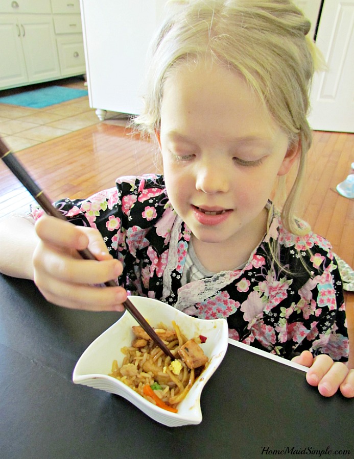 Chopsticks in the hand, Chopsticks in the hair. Family Asian night is a success! #NoTakeOutNeeded ad