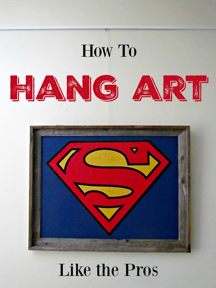 How to hang art like the pros