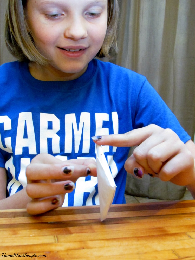 Learn to make your own paper footballs in The Football Fanbook. ad