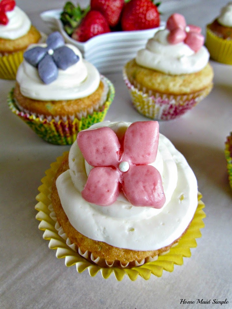 Vanilla Cupcakes with Strawberry Curd Filling and a Starburst Flower