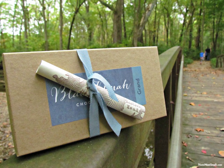 Escape the stresses of the world with a box of Black Dinah chocolates and nature. ad