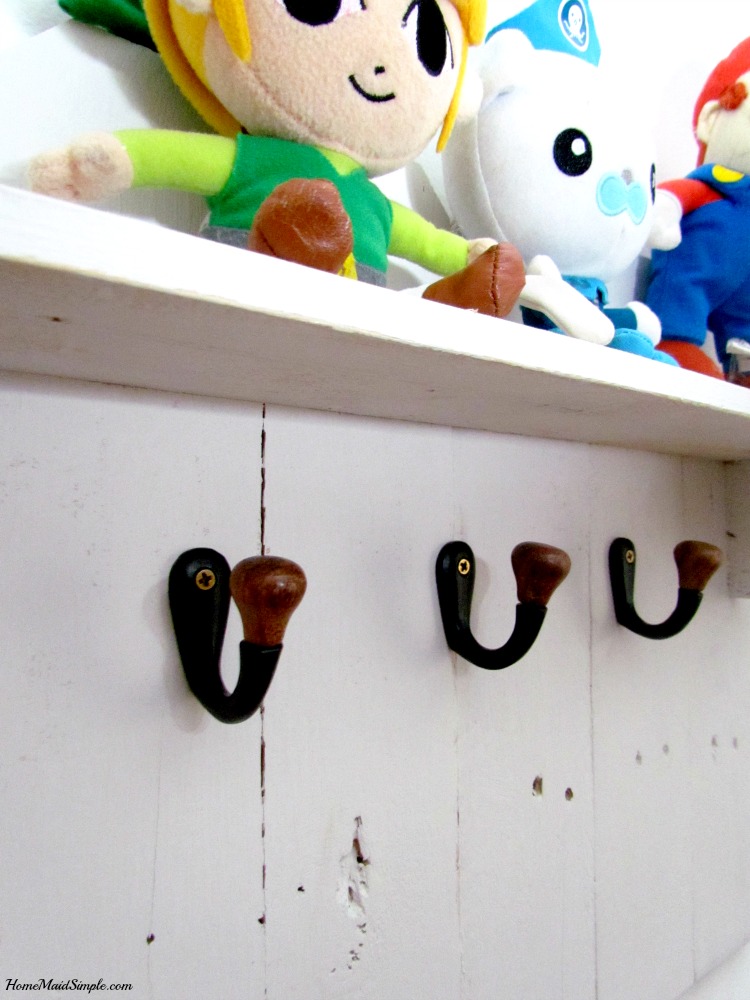 Upcycle an old fence into a hat rack. ad